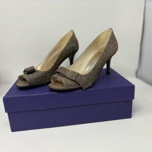 Stuart Weitzman shimmery peek toe heel with cute bow design